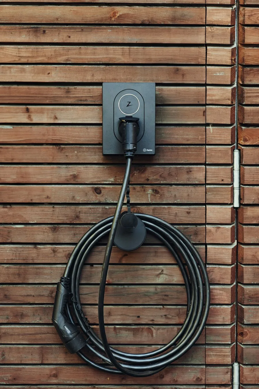 Modern residential EV charger installed on a home